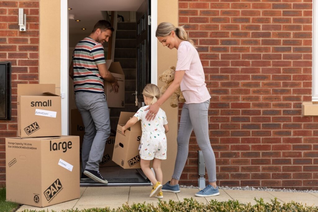 Family moving into a new home in Mid-Michigan while deciding whether to sell before buying another house.